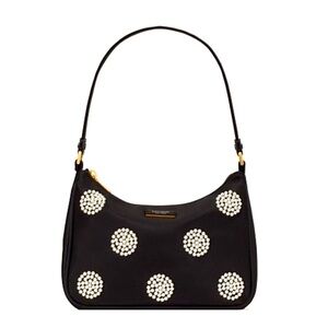 Kate Spade Embellished durable woven nylon with leather trim
Matte lining